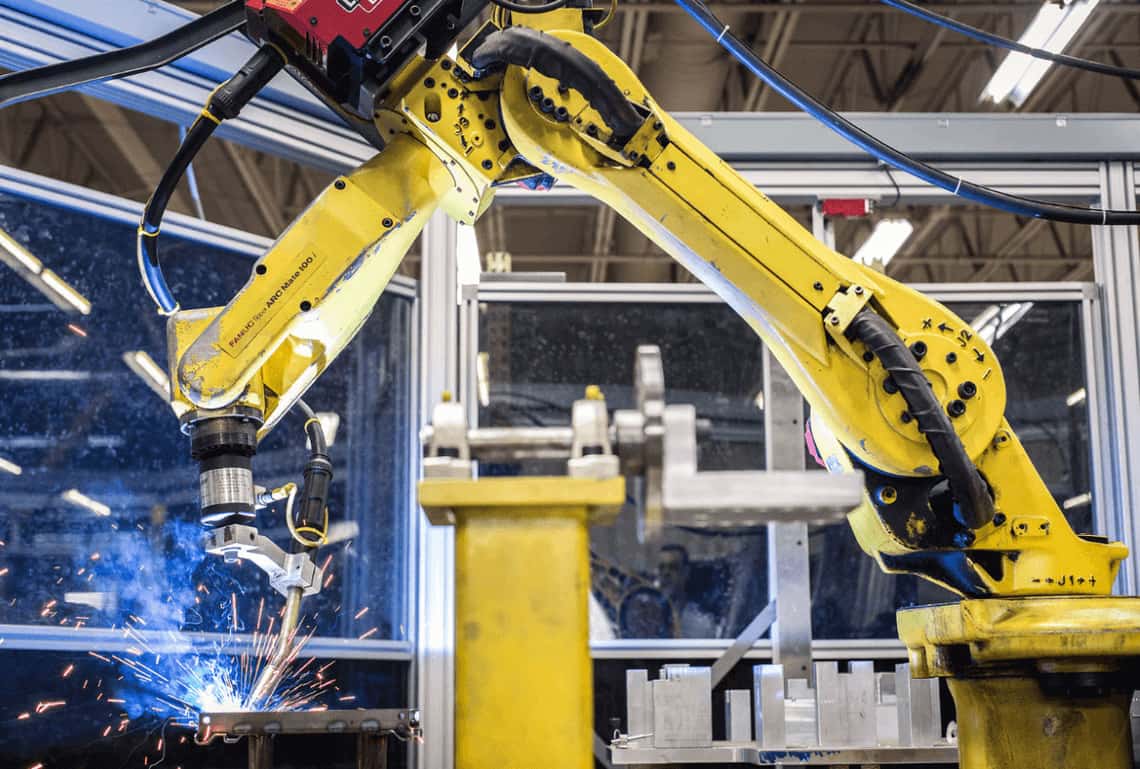A robot working with low-volume metal fabrication suppliers