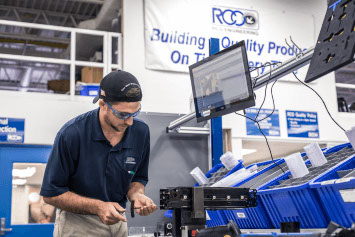 A worker at RCO aerospace assembles a seat in our manufacturing facility made by aerospace manufacturing services