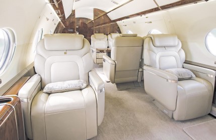 Interior of a business jet appointed in leather made by aerospace manufacturing services