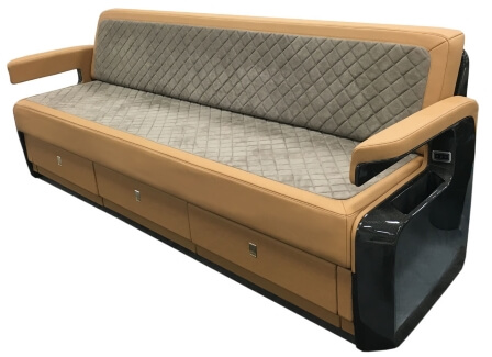 A custom divan for a business jet made by aerospace manufacturing services