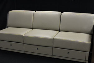A leather appointed aerospace Divan made by aerospace manufacturing services