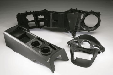 Automotive components made by low volume injection molding        