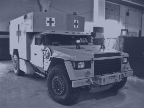 A full scale prototype of a defense industry ambulance made by rapid prototyping services